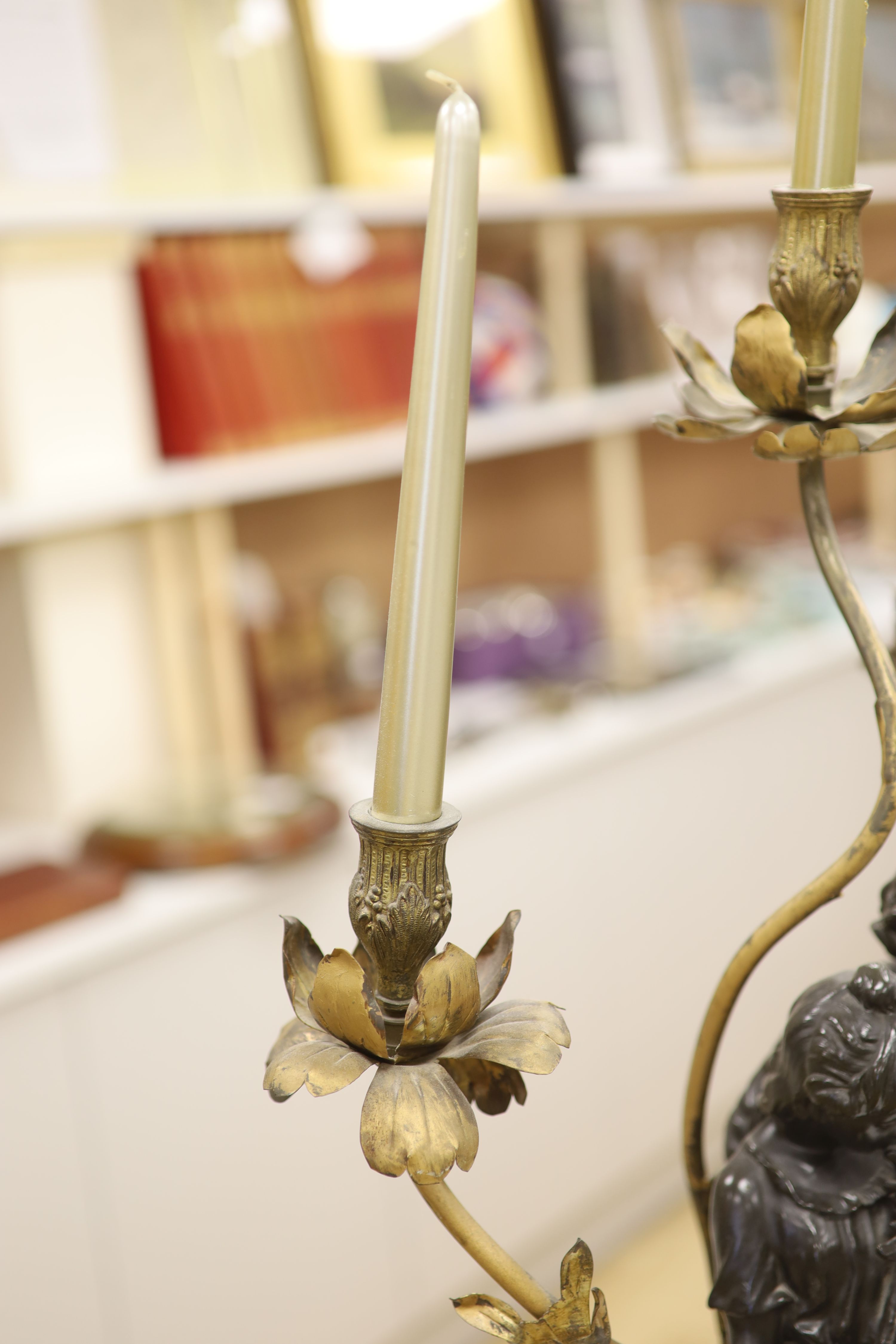 A spelter figural three branch candelabra, height 71cm